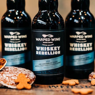 Warped Wing Brewing Co. is releasing its 2025 Whiskey Rebellion Imperial Stout (aged in bourbon barrels), along with a new lineup of flavored variants on Saturday, Dec. 6 (CONTRIBUTED PHOTO).