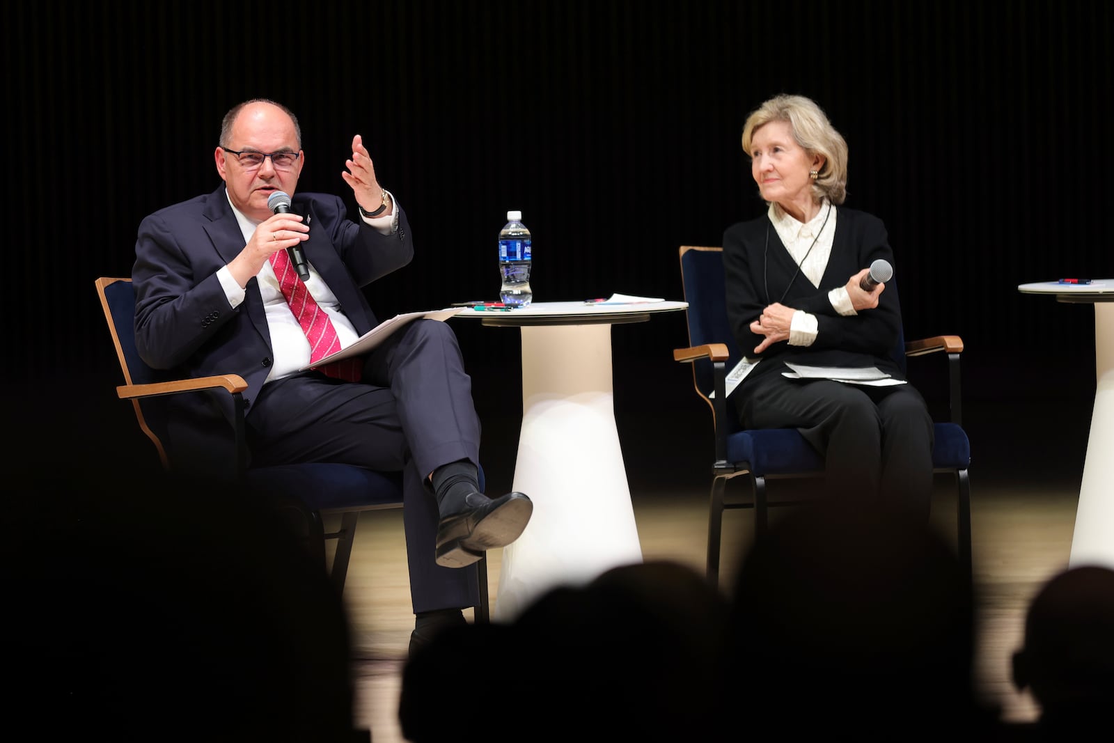 High Representative for Bosnia and Herzegovina Christian Schmidt, left, speaks with former U.S. Ambassador to NATO and U.S. Senator Kay Bailey Hutchison during a panel discussion at the NATO Parliamentary Assembly in Dayton, Ohio, Friday, May 23, 2025. (AP Photo/Paul Vernon)