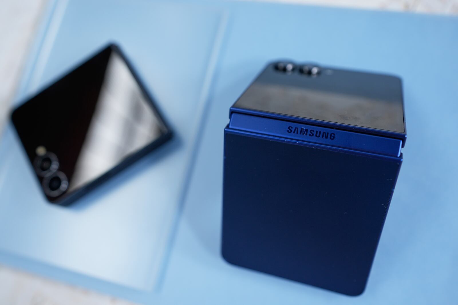 The new Galaxy Z Flip 7 is displayed during a Samsung preview event in New York, Monday, July 7, 2025. (AP Photo/Seth Wenig)