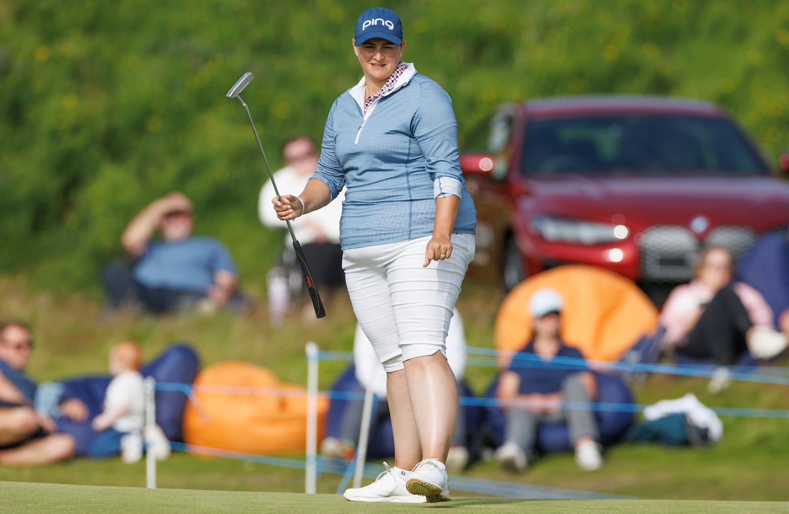 Charlotte Laffar of England, reacts after putting during the first round of the women's Scottish Open golf tournament, Thursday, July 24, 2025, at Dundonald Links in Irvine, Scotland. (Steve Welsh/PA via AP)