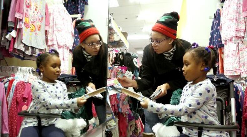 The National Retail Federation estimates 115-million people nationwide will go shopping on Black Friday this year, and shoppers need to be more alert, according to police who patrol Austin Landing and the Dayton Mall. FILE PHOTYO