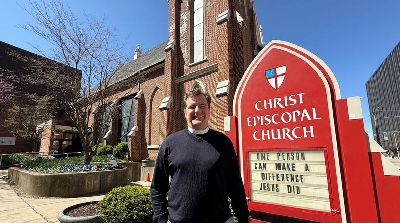 Rev. Peter Homeyer with Christ Episcopal Church at 20 W. First St. in downtown Dayton. The church, which is inside the NATO Village security perimeter, will provide a sanctuary for peace every day during the NATO Parliamentary Assembly from Thursday to Monday. CORNELIUS FROLIK / STAFF