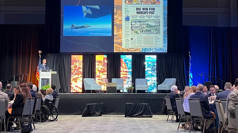 Members and supporters of the Dayton Development Coalition celebrated the growth of Wright-Patterson Air Force Base at the coalition's annual meeting Wednesday at the Dayton Convention Center. THOMAS GNAU/STAFF