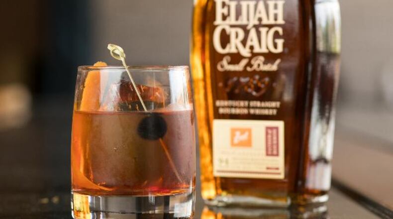 July 19, 2018 - Marietta, Ga: Zeal restaurant's signature drink the Zeal Old Fashion is shown with a bottle of Elijah Craig's small batch kentucky straight bourbon whiskey Thursday, July 19, 2018, in Marietta, Ga. This is part of a Q&A on Zeal restaurant owner and chef Scott Sawant about his upcoming participation in the Taste of Atlanta in October. This is scheduled to run in the 2018 September issue of Living Northside. (JASON GETZ/SPECIAL TO THE AJC)