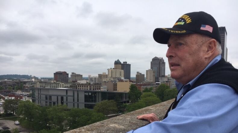 Sandy Mendelson, atop his eight-story First Street building looking over downtown Dayton, in a 2017 photo. THOMAS GNAU/STAFF