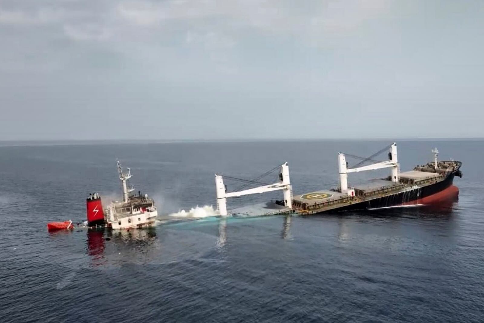 This image released by Ansar Allah Media Office in Yemen shows the Liberian-flagged bulk carrier Eternity C is seen as it sinks in the Red Sea, Wednesday, July 9, 2025.( Ansar Allah Media Office via AP)