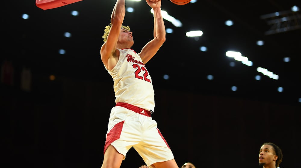 Miami's Brant Byers slams one home against Old Dominion on Monday night at Millett Hall. KYLE HENDRIX / CONTRIBUTED