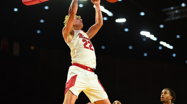 Miami's Brant Byers slams one home against Old Dominion on Monday night at Millett Hall. KYLE HENDRIX / CONTRIBUTED