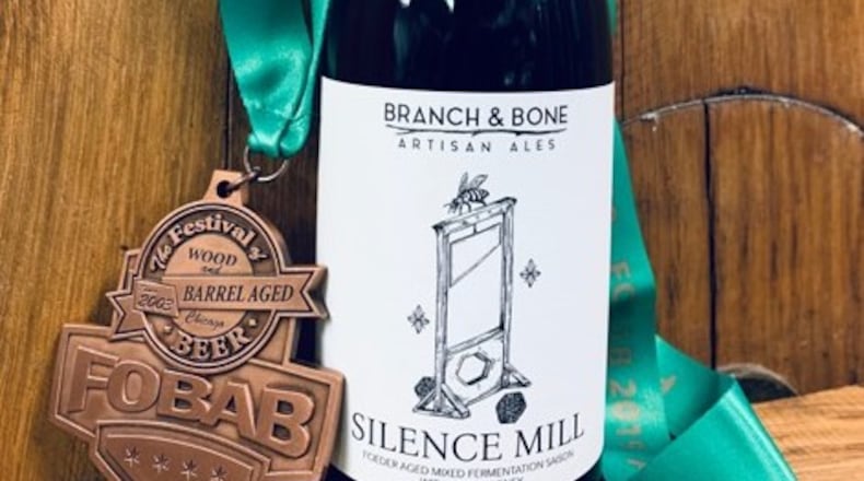 Dayton craft brewery Branch & Bone scores a bronze medal for its 'Silence Mill' at the Festival of Wood- and Barrel-Aged Beer held last weekend in Chicago.