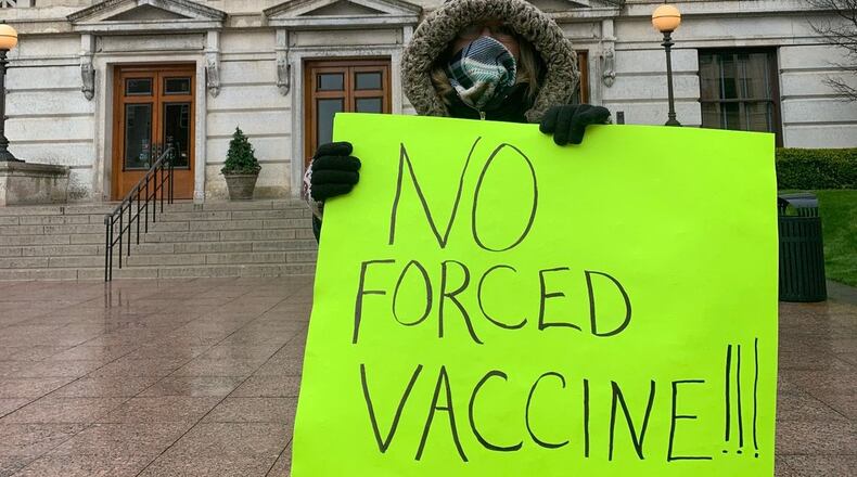 Protesters at the Ohio Statehouse demonstrating against the DeWine administrations shutdown orders during the pandemic have included those who oppose government mandated vaccinations.