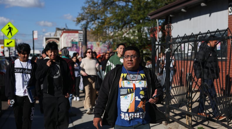 Baltazar Enriquez, president of the Little Village Community Council, walks with a Chicago Public School's student walkout in protest against U.S. Immigration and Customs Enforcement (ICE) agents around Chicago's Little Village neighborhood, Wednesday, Oct. 29, 2025. (AP Photo/Talia Sprague)