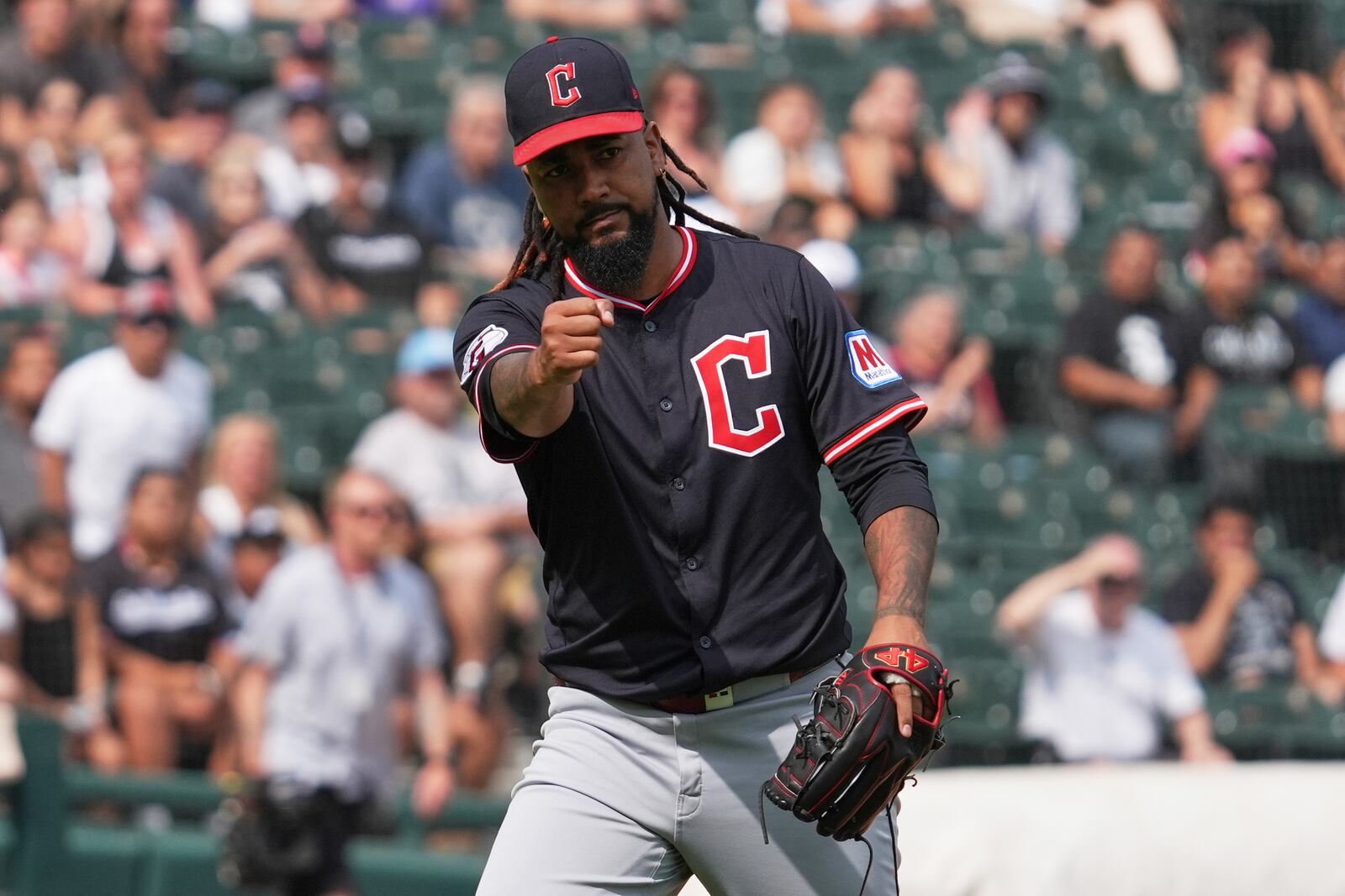 Cleveland Guardians relief pitcher Emmanuel Clase celebrates after his team defeated the Chicago White Sox in a baseball game in Chicago, Sunday, July 13, 2025. (AP Photo/Nam Y. Huh)