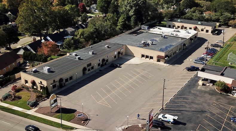 The Fountain Square Shopping Center at 3109 Far Hills Avenue could get a new look, if plans are approved. STAFF/TY GREENLEES