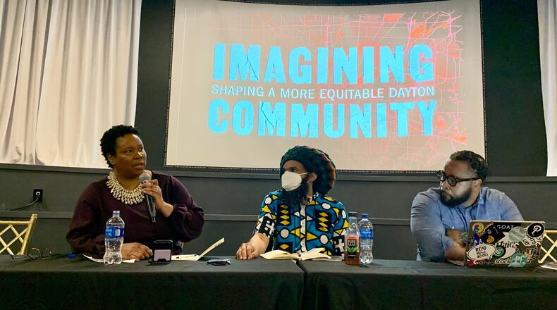 On the first day of the Imagining Community Symposium, Sinclair Community College professors (from left to right) Furaha Henry-Jones, Faheem Curtis-Khidr and Amaha Sellassie discuss how to shape a more equitable Dayton.