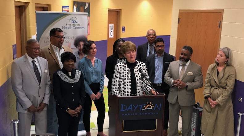 Representatives of Dayton Public Schools, Five Rivers Health Centers and the city of Dayton announce plans to open a student health center at an April media event. The center will be located in the newly named Roosevelt elementary school at 1923 W. Third St. JEREMY P. KELLEY / STAFF