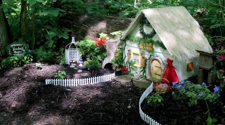 These miniature dwellings along the trail at the Aullwood Nature Center have a fairy tale theme. CONTRIBUTED/DAVID ANDERSON