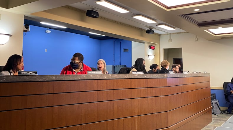 Dayton Public School Board members gather for a meeting on Jan. 17. Eileen McClory / Staff