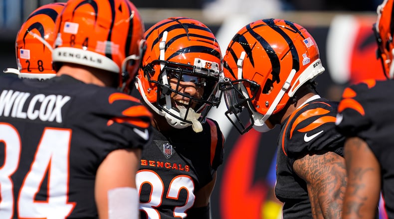 Cincinnati Bengals wide receiver Tyler Boyd (83) celebrates touchdown catch against the Atlanta Falcons in the first half of an NFL football game in Cincinnati, Sunday, Oct. 23, 2022. (AP Photo/Jeff Dean)