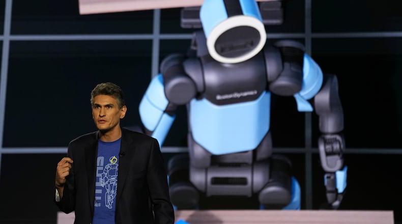 Vice president and general manager of Atlas at Boston Dynamics, Zachary Jackowski, talks during a Hyundai and Boston Dynamics news conference ahead of the CES tech show, Monday, Jan. 5, 2026, in Las Vegas. (AP Photo/Abbie Parr)