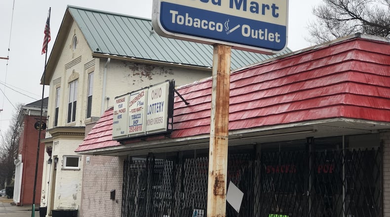 The former Convenient Plus Food Mart could become a grocery store, diner-type operation or food hub. CORNELIUS FROLIK / STAFF