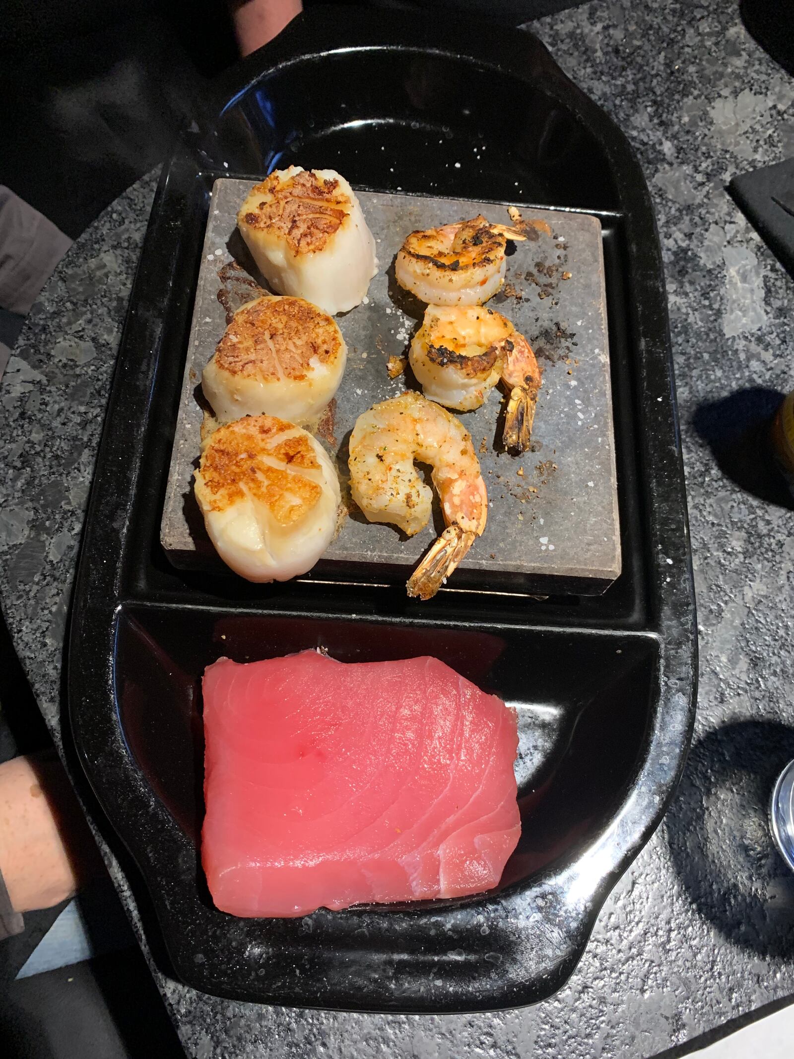Scallops and shrimp cooking at Black Rock Bar and Grill with an Ahi tuna steak on deck. CONTRIBUTED/ALEXIS LARSEN