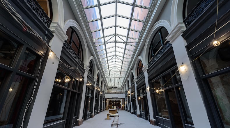 Here’s a January 2025 look at construction progress of the Dayton Arcade’s North Arcade in downtown Dayton. The North Arcade includes the Third Street and Gibbons Buildings, a second phase of development that will include a marketplace retail environment and a 93-room Hilton Garden Inn, projected to open in the first quarter of this year. TOM GILLIAM / CONTRIBUTING PHOTOGRAPHER