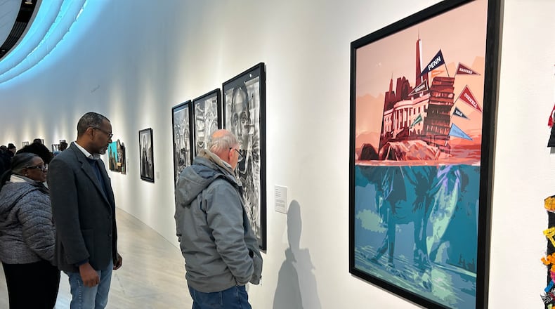 Springfield Museum of Art visitors check out its latest exhibition, "Black Lives as Subject Matter III," a follow-up to an award-winning exhibition, which features the works of more than 20 local and regional Black artists. BRETT TURNER / CONTRIBUTED