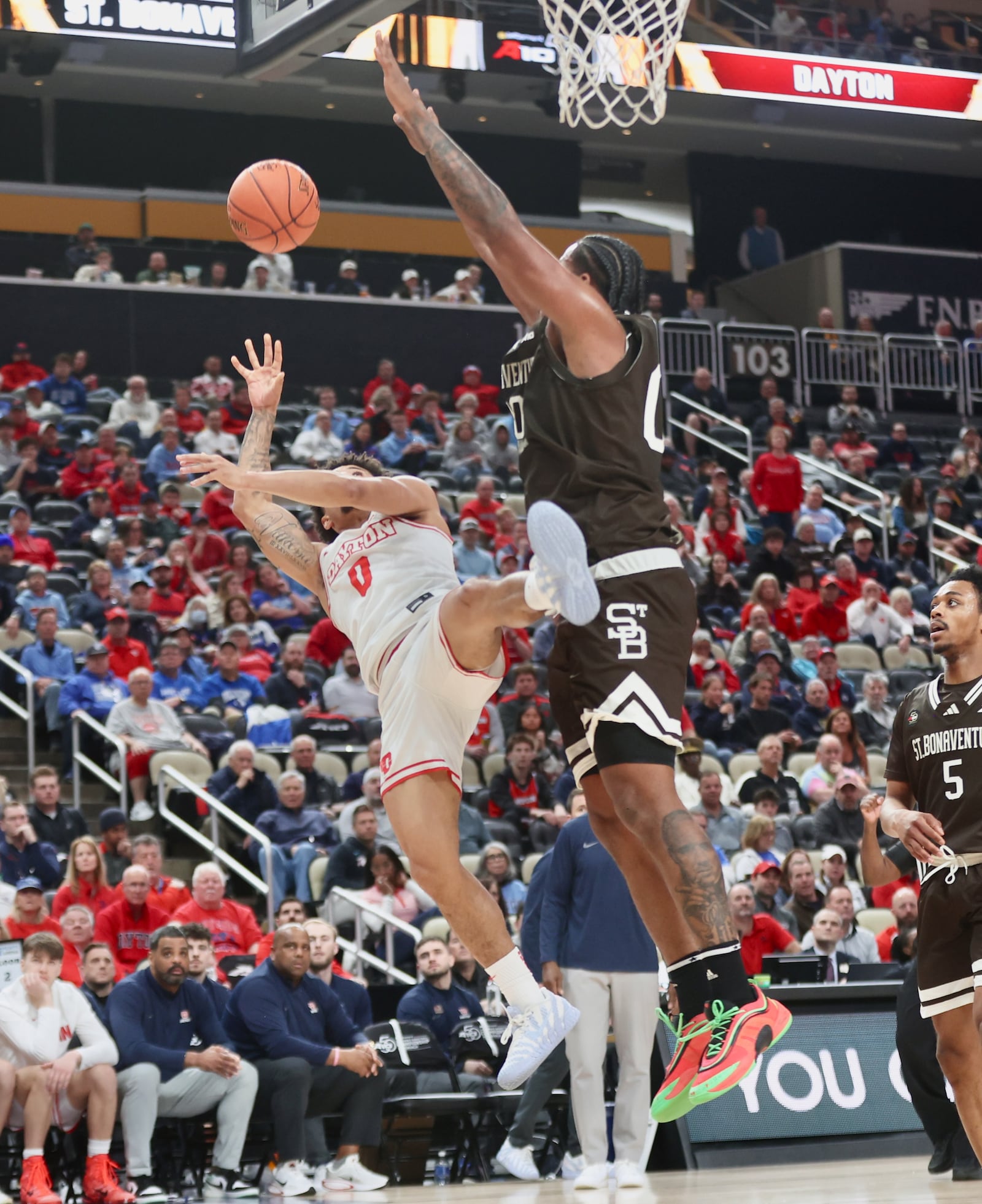 Dayton's Javon Bennett draws a foul in the second half against St. Bonaventure in the quarterfinals of the Atlantic 10 Conference tournament on Friday, March 13, 2026, at PPG Paints Arena in Pittsburgh. David Jablonski/Staff