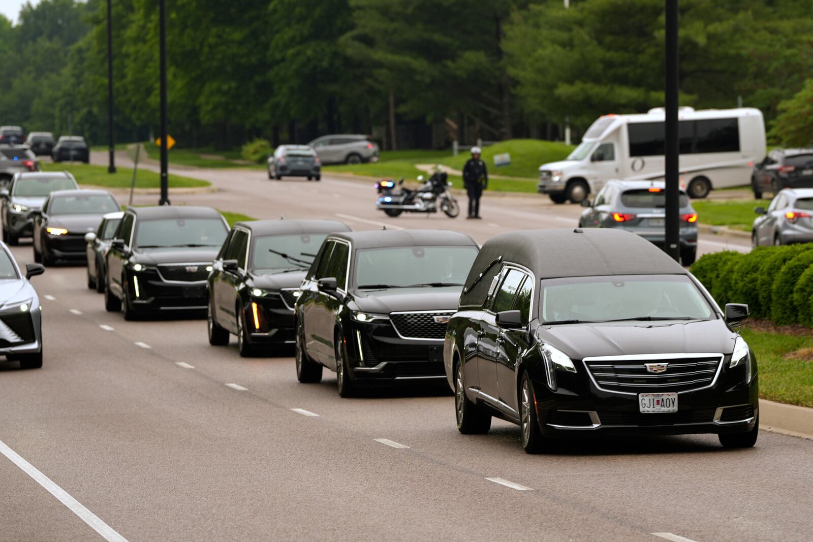 A funeral procession leaves Congregation Beth Torah after a funeral for Sarah Milgrim, a staffer at the Israeli Embassy who was killed last week outside a Washington Jewish museum, Tuesday, May 27, 2025, in Overland Park, Kan. (AP Photo/Charlie Riedel)