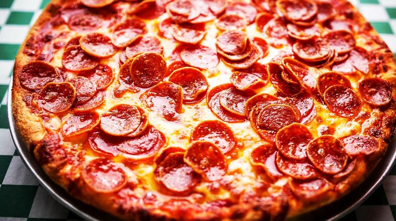 Tony Clark, the owner of DK Effect, a Gionino’s Pizzeria location in the former site of Brother’s tire shop, 1528 E. Third St.