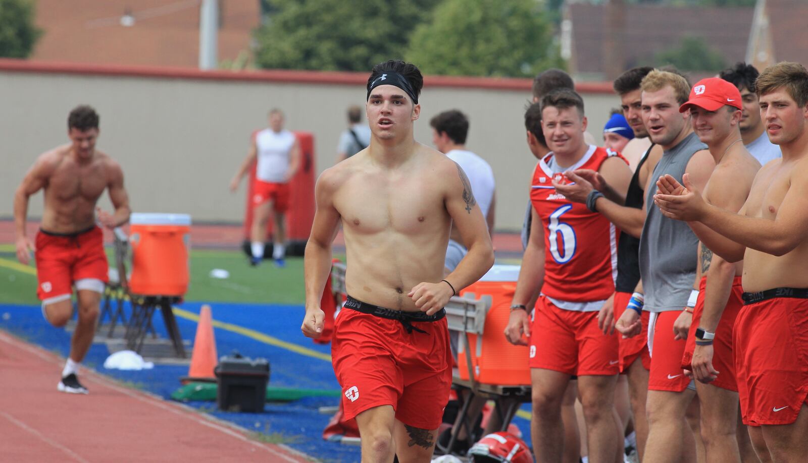 Dayton safety Nick Dymek completes the mile in the 5 minutes, 44 seconds on the track at Welcome Stadium after the first practice of the season on Monday, Aug. 9, 2021, in Dayton. Dymek had the fastest time of any player on the roster. The one-mile run tradition goes back decades with the program. David Jablonski/Staff