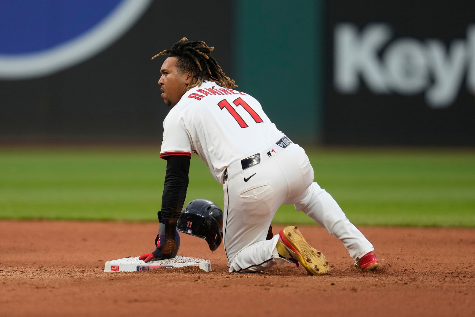 Cleveland Guardians' Jose Ramirez (11) steals second base in the seventh inning of a baseball game against the Minnesota Twins in Cleveland, Wednesday, April 30, 2025. (AP Photo/Sue Ogrocki)