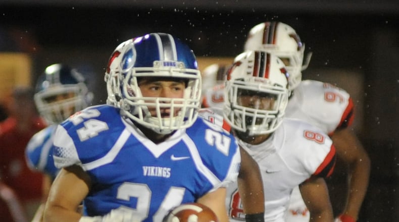 Miamisburg junior running back Tony Clark scored twice in a 45-12 Week 4 loss to visiting Wayne. Both teams remain No. 1 in the Power Rankings, Wayne in D-I and Miamisburg in D-II. MARC PENDLETON / STAFF
