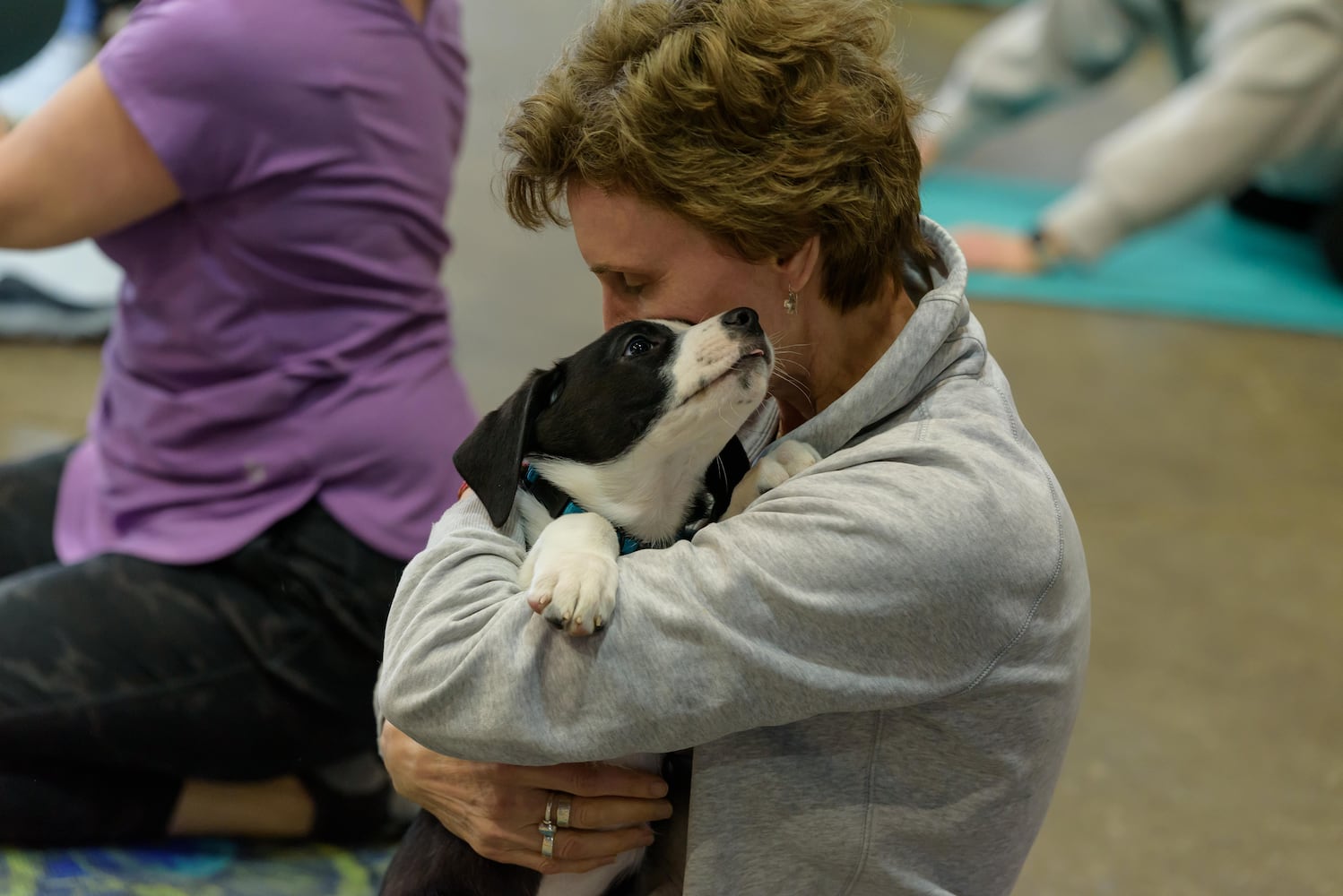 PHOTOS: Puppy Yoga with Adopt a Pit at Base Camp Outdoors Co. in downtown Dayton
