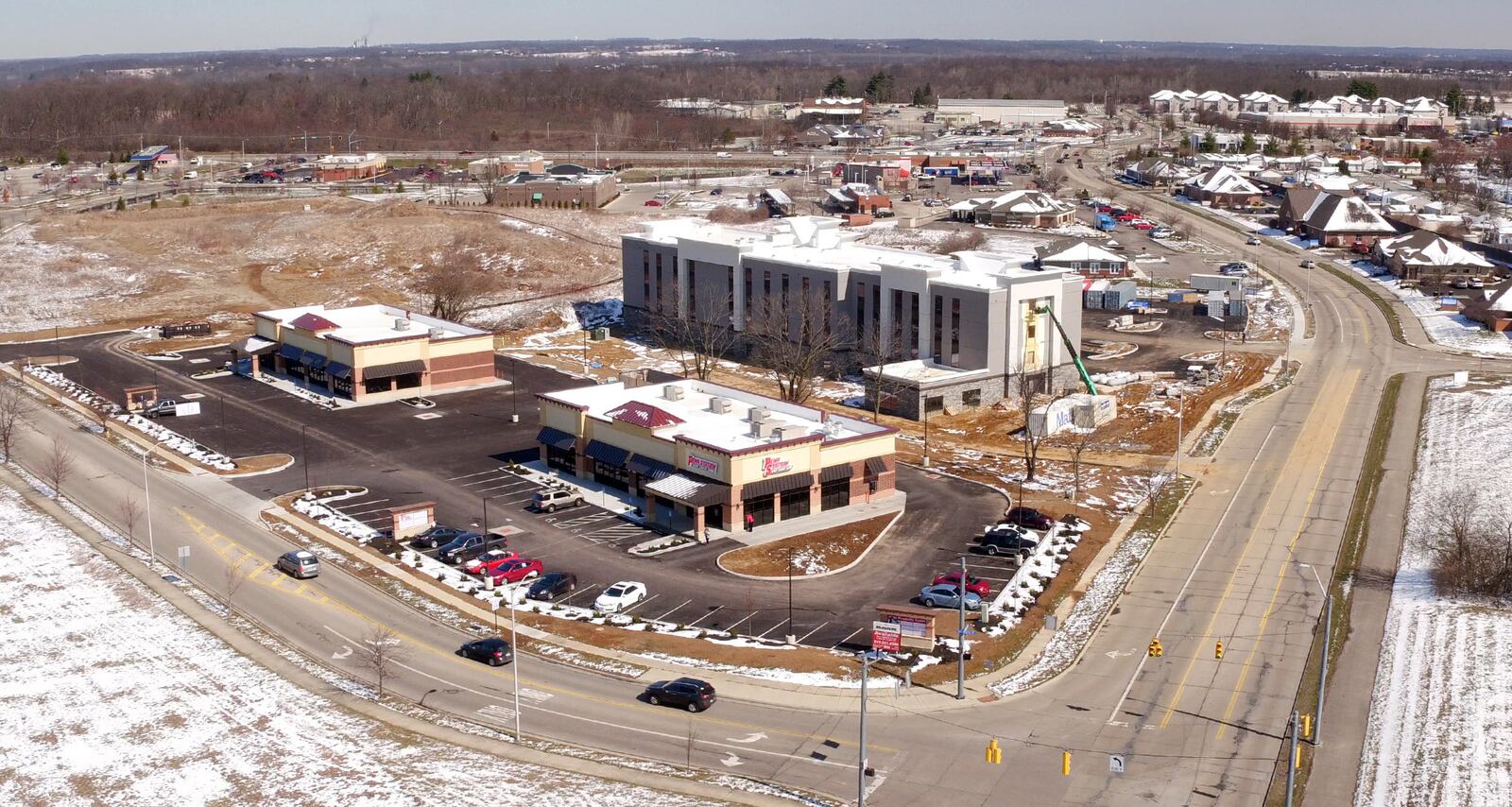 The new Hampton Inn and Suites is nearing completion in Xenia.  The 88-room hotel will offer amenities that American travelers will be accustomed to -- an indoor pool, conference space and lobby with an area for breakfast. Penn Station East Coast Subs is open for business on Hospitality Drive in Xenia.  The sub shop occupies one of two new retail storefront buildings constructed on Hospitality Dr. directly behind the Hampton Inn.   TY GREENLEES / STAFF