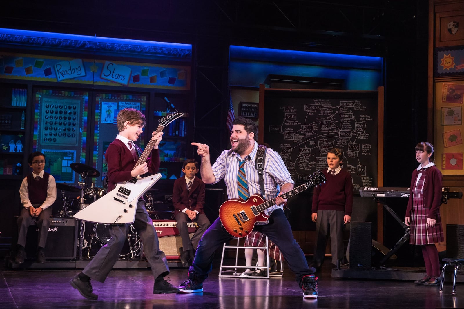 Rob Colletti, in a role originated by Jack Black, portrays Dewey Finn in “School of Rock: The Musical.” CONTRIBUTED