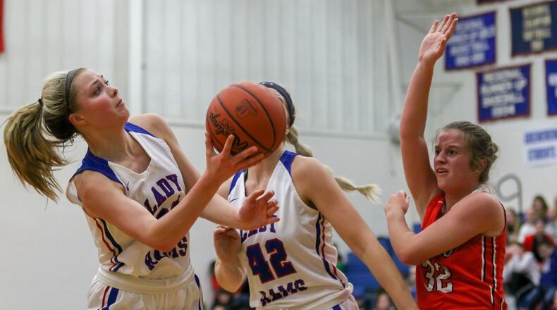 Greeneview High School junior Sylvie Sonneman shoots the ball as Cedarville sophomore Elly Coe attempts to block it during their game in Jamestown on Thursday, Dec. 21. The Rams won 44-39 in overtime. CONTRIBUTED PHOTO BY MICHAEL COOPER