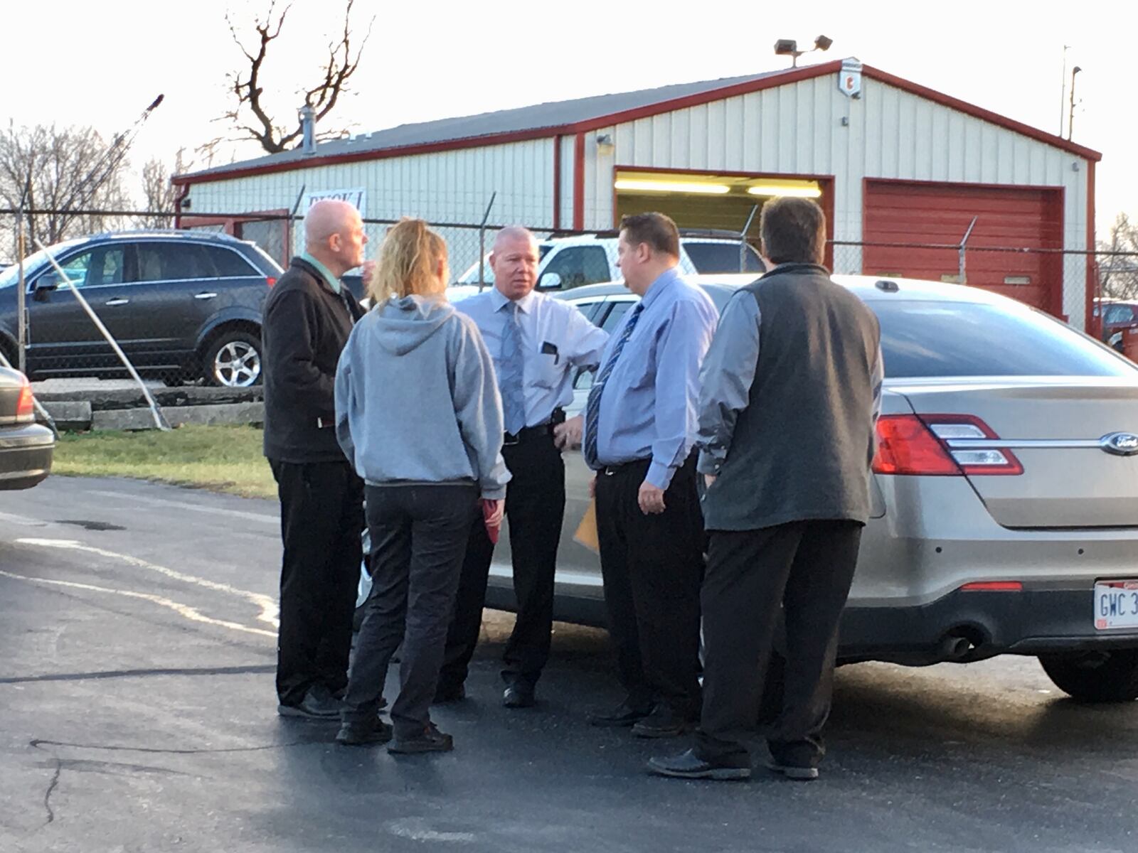 Detectives were still on scene at 6 p.m. Monday at Buck-I Auto Sales on North Dixie Drive after two men were found shot to death inside the dealership. The men were identified as Frank D. Buck, 71, and Lester Golson, 59. MARK GOKAVI/Staff