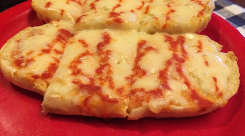 El Greco's cheese bread is loaded with provolone.