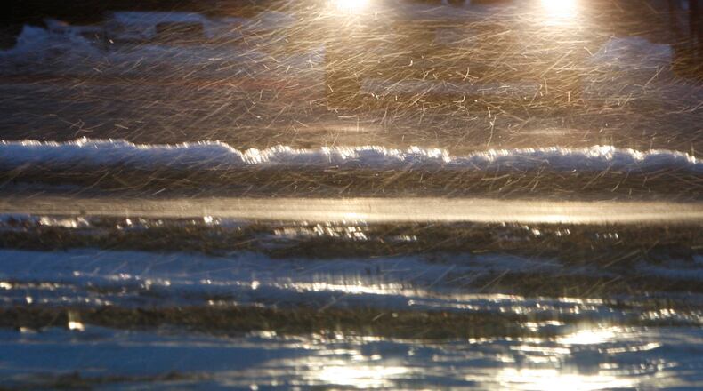 Dayton area residents began cleaning up the mess left a by an ice storm that continued through Wednesday, February 2, 2011. Few schools were open on Wednesday. Wilmington schools were open and main roads in Clinton County were mostly dry.