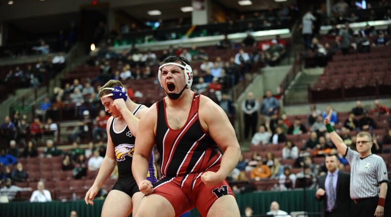 Wayne’s Jacob Padilla celebrates his state championship in the 285-pound weight class Saturday night at the Schottenstein Center in Columbus. Greg Billing/CONTRIBUTED