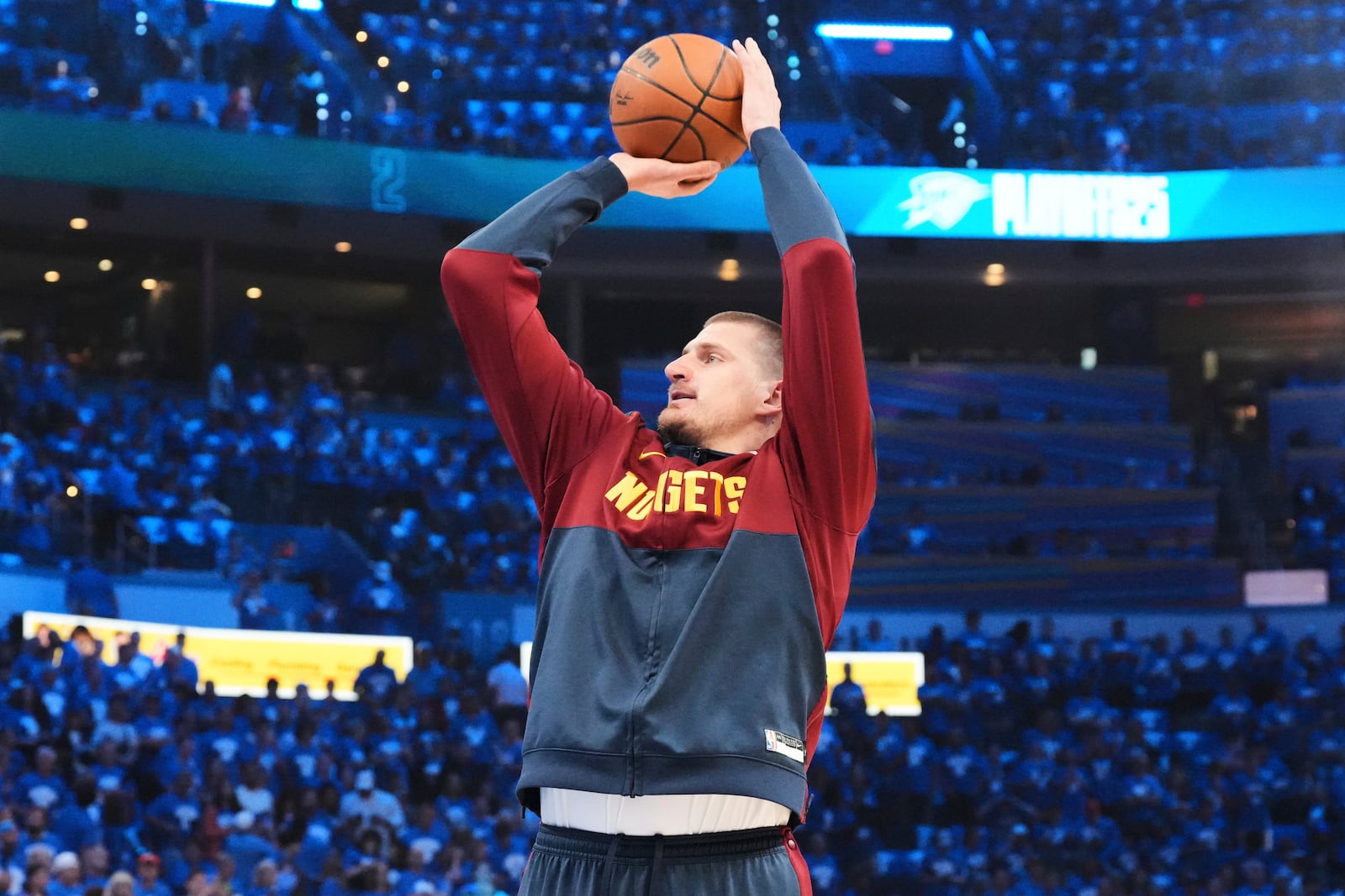Denver Nuggets center Nikola Jokic warms up before Game 7 in the Western Conference semifinals of the NBA basketball playoffs against the Oklahoma City Thunder, Sunday, May 18, 2025, in Oklahoma City. (AP Photo/Kyle Phillips)