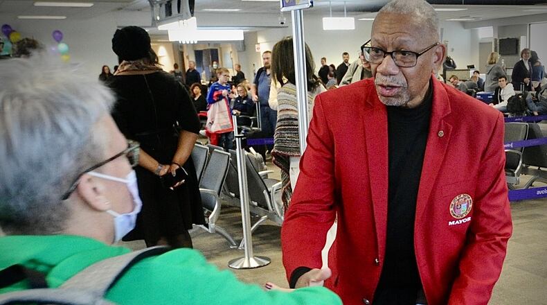Dayton Mayor Jeffrey J. Mims Jr. greeted travelers from Orlando on Friday, Jan. 13, 2023. Avelo Airline's first full flight embarked also from the Dayton International to return to Orlando Friday. MARSHALL GORBY\STAFF