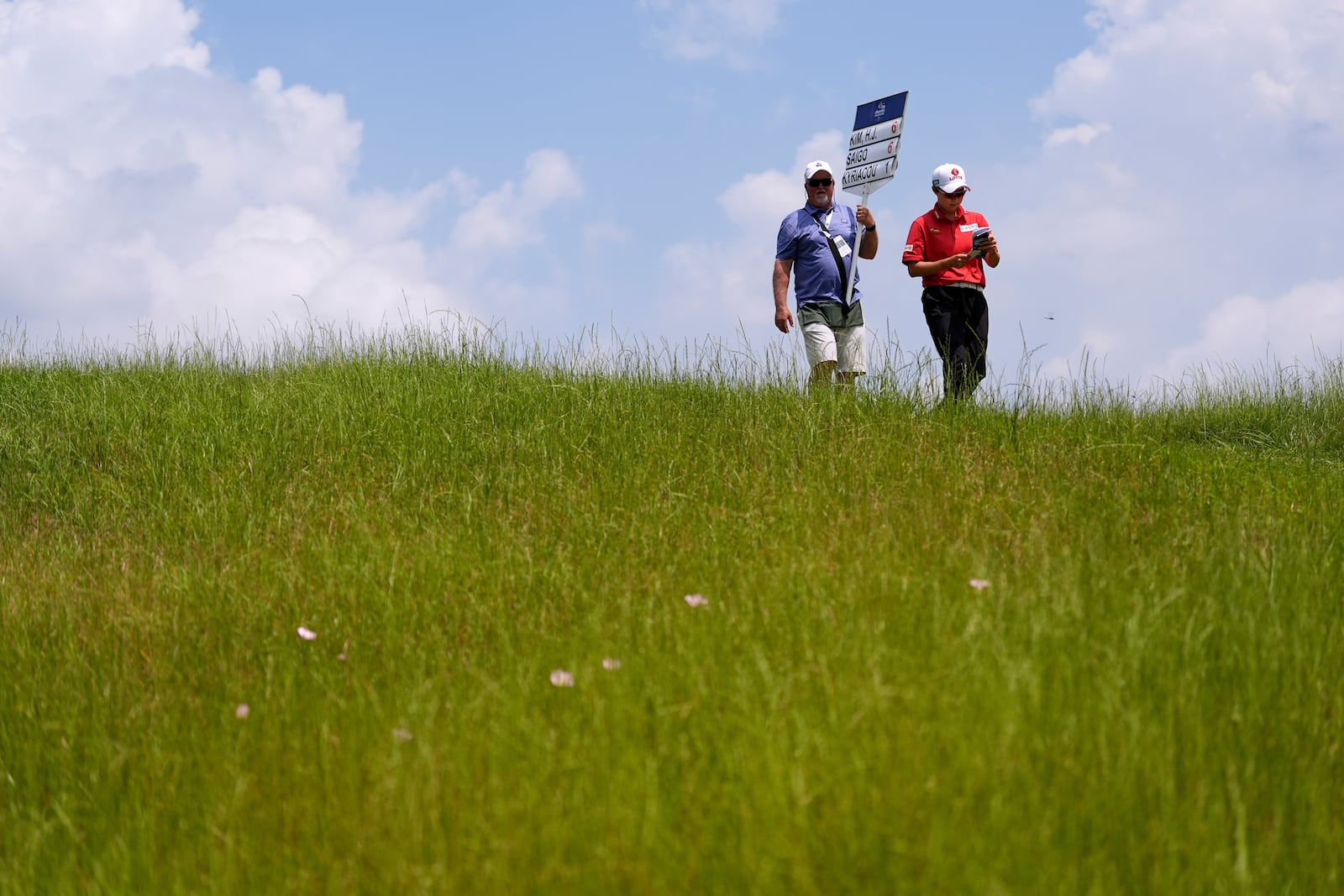 Hyo Joo Kim, of South Korea, walks on the ninth hole during the second round of the Chevron Championship LPGA golf tournament Friday, April 25, 2025, in The Woodlands, Texas. (AP Photo/Ashley Landis)