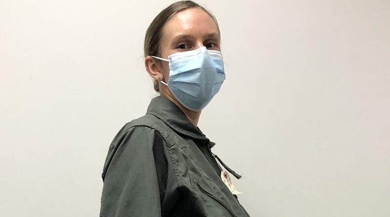 First Lt. Avery Thomson, the lead program manager for Maternity Development efforts in the Air Force Uniform Office, models a Maternity Flight Duty Uniform while wearing an artificial pregnancy bump. COURTESY PHOTO