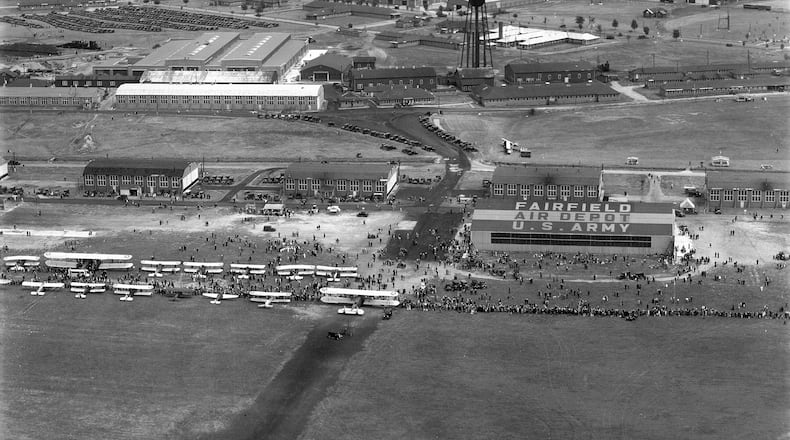 Aerial view of the Air Corps Carnival at Fairfield Air Depot, 1930. Thousands of spectators attended the airshow and carnival on the Fairfield Air Depot Reservation flightline. In the foreground a “modern” steel hangar (now Building 145 in Area A, Wright-Patterson Air Force Base) carries the inscription “Fairfield Air Depot U.S. Army.” FAD Headquarters (Building 1) can be seen at the top center.