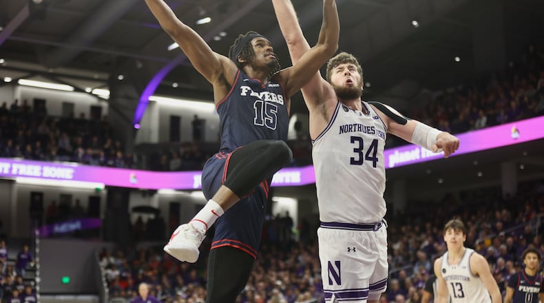 Dayton's DaRon Holmes II dunks against Northwestern on Friday, Nov. 10, 2023, at Welsh-Ryan Arena in Evanston, Ill. David Jablonski/Staff