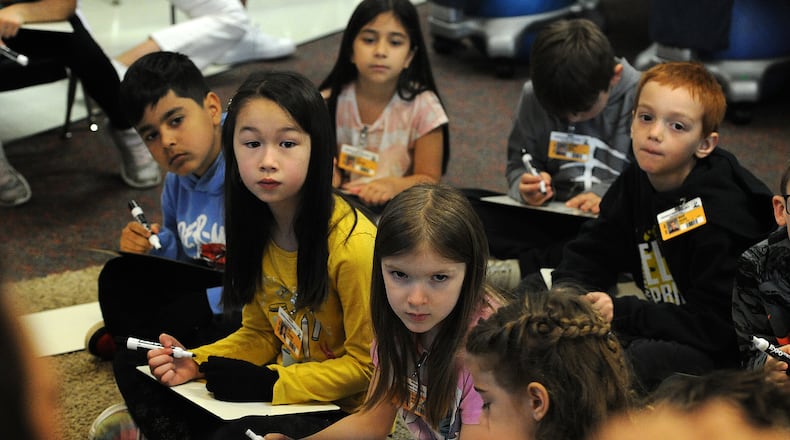 First grade students in Sarah Jacobs math class work on addition and subtraction skills Monday, April 22, 2024 at the Primary Village North school in Centerville. MARSHALL GORBY\STAFF