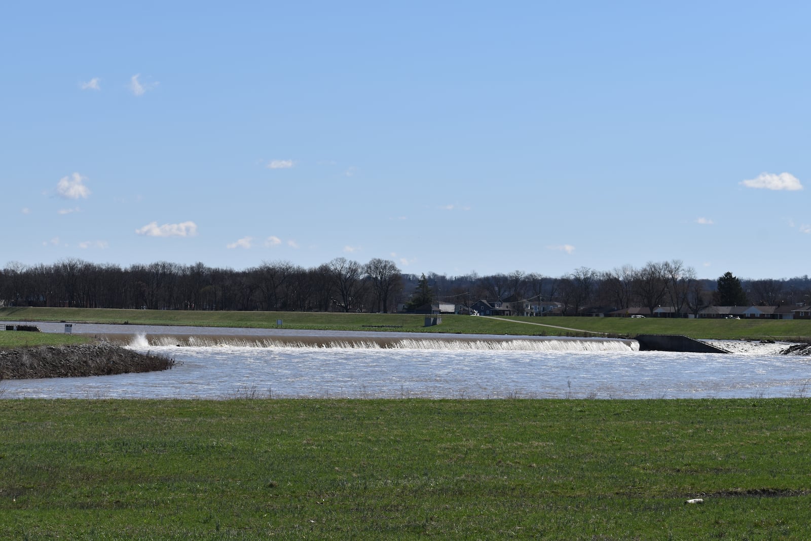 The dam in West Carrollton pictured Thursday, March 12, 2026 in the area along East Dixie Drive just west of Interstate 75's Exit 47 where the city plans to build the West Carrollton Whitewater Park, which will include safety improvements to this portion of the Great Miami River to reduce drowning hazards. SAM WILDOW/STAFF