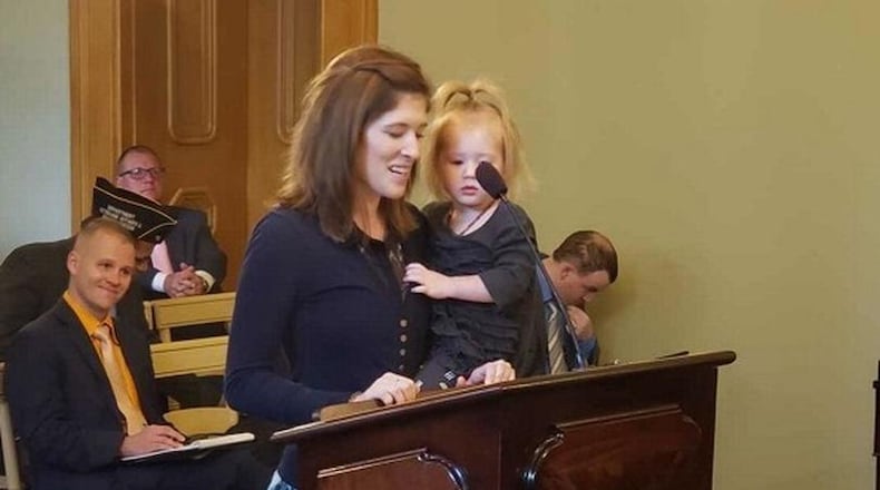 Brianna McKinnon, of Dayton, testified last year before members of the Ohio House about a bill she worked on with Ohio Rep. Rick Perales, R-Beavercreek. The bill will grant temporary professional licenses to members of the military and their spouses. FILE